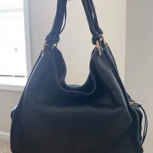 Brand new with tags black Stuart Weitzman bag- perfect condition!